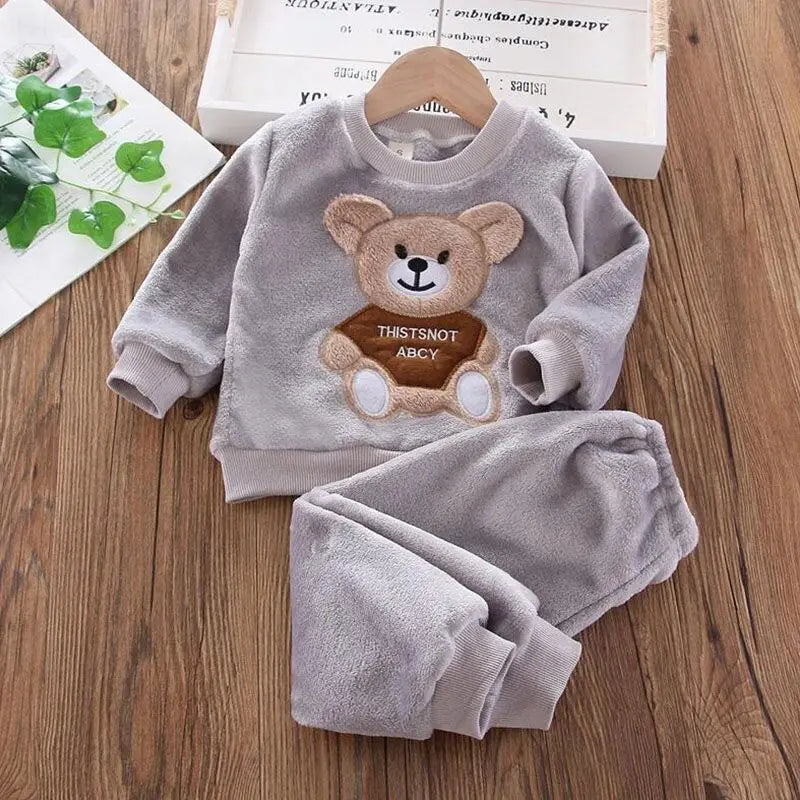 "Warm & Cozy Winter Set" "Cute Cartoon Design" "Soft Fleece Comfort" "Perfect Toddler Outfit" "Easy Pullover Style"